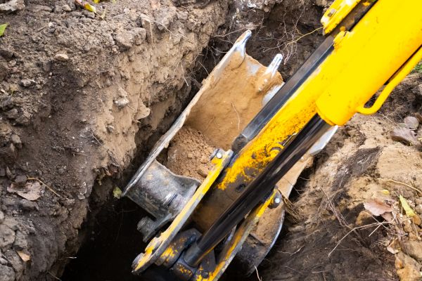 Downspout Trenching in Layton